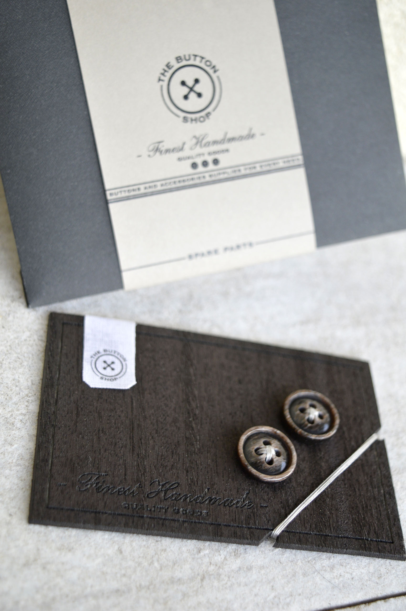 Hangtag with spare buttons